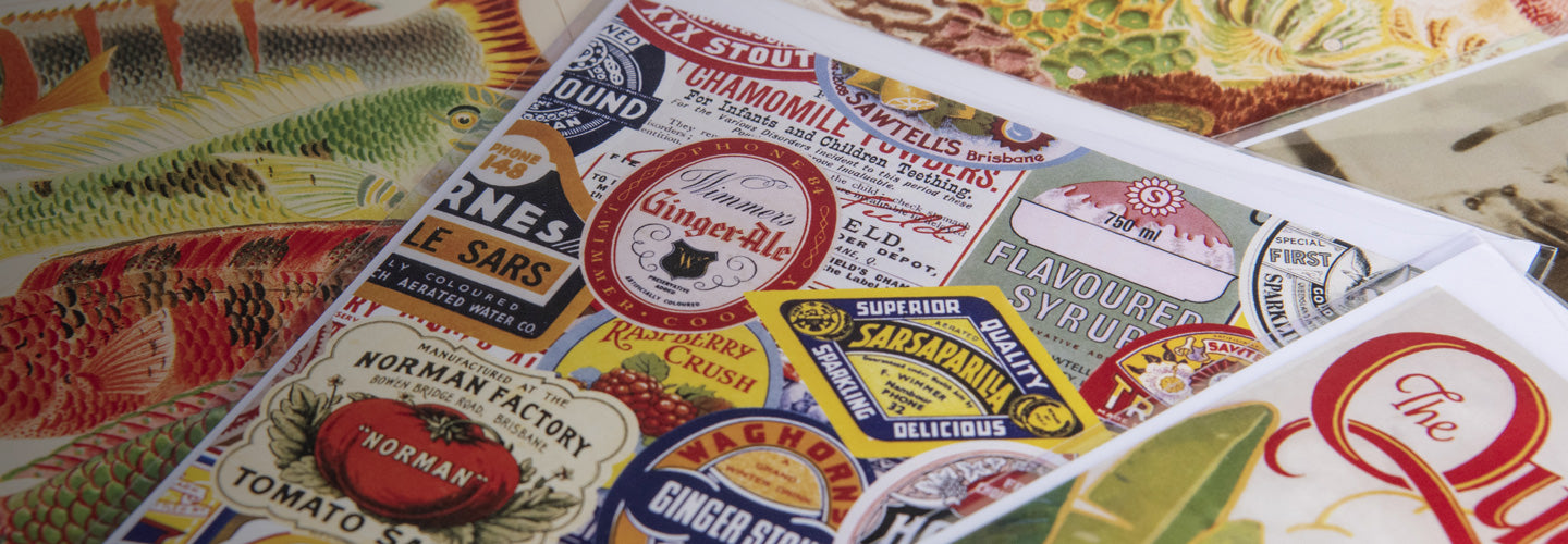 Close-up of cards featuring covers made from State Library collections.
