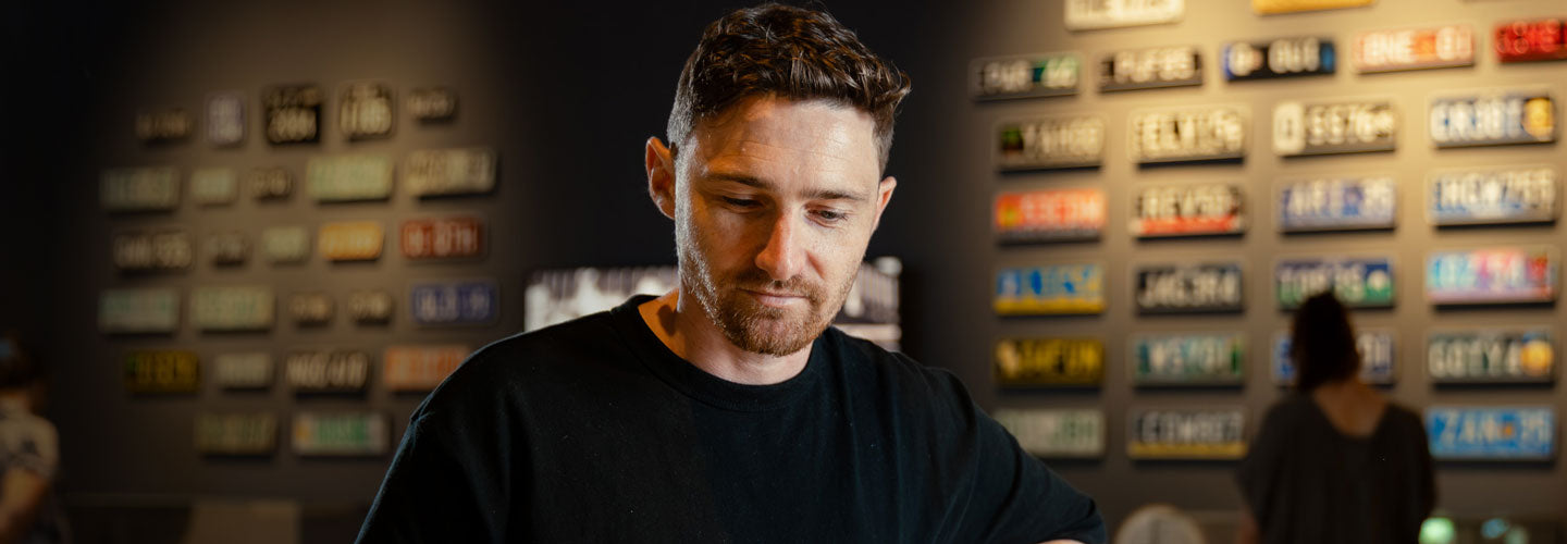 Man inside the exhibition space at State Library